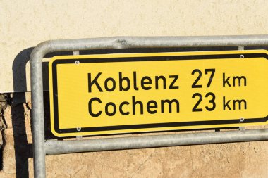 street sign to towns in Germany clipart