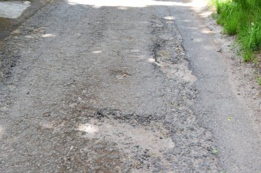 Eski kirli asfalt yolu çatlaklar, doku, arka plan