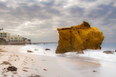 El Matador Beach Coastline With a Big Cliff in the Water on the Seashore in California clipart