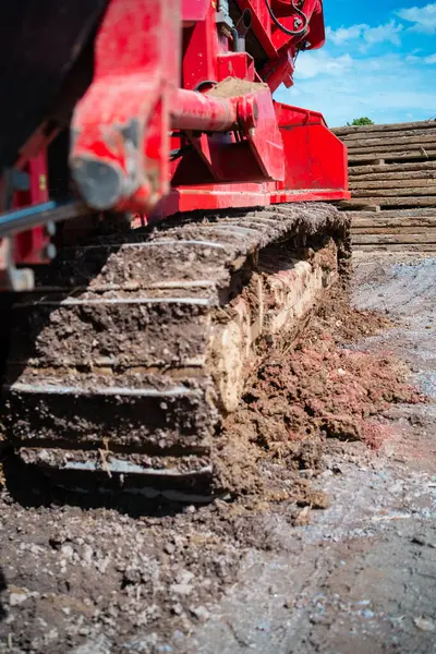 stock image Dirty Continious Track of a Construction Vehicle on a Civil Engineering Construction Site