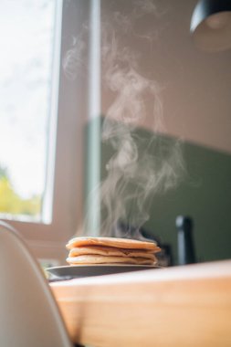 Steaming Stack of Pancakes for Breakfast clipart