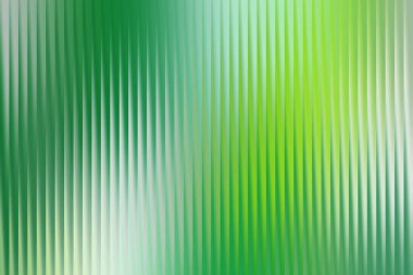 This captivating image features a beautiful abstract background with a blend of green tones, creating a visually appealing texture for various creative applications.