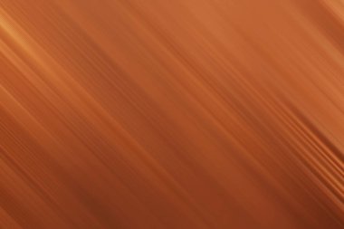A visually appealing backdrop featuring blurred lines in brown and orange, perfect for adding a touch of warmth and elegance to any design or presentation.