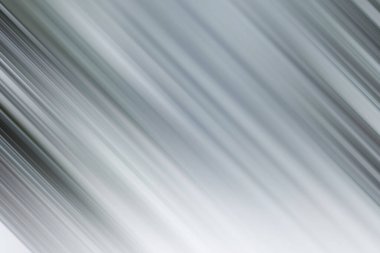 Tasarımlara modern ve sofistike bir dokunuş eklemek için ideal, köşegen çizgileri bulanık, zarif, gri bir arkaplan. Web siteleri, pankartlar ve sunumlar için harika.