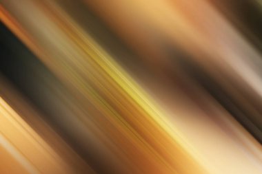 Kahverengi ve altın tonlarında bulanık köşegen çizgileri içeren soyut bir arkaplan, derinlik ve hareket eklemek için mükemmel dinamik ve sıcak bir görsel doku yaratır..