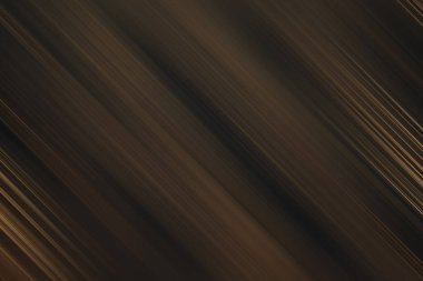 Çapraz ışık çizgileri ve hareket bulanıklığı etkisi olan soyut koyu kahverengi bir arka plan. Sıcaklığı, yüzeyselliği ve ince, sofistike bir enerjiyi çağrıştırıyor..