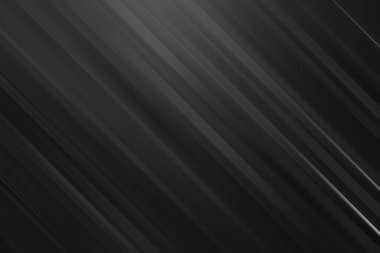 Koyu gri soyut bir arka plan. Çapraz çizgiler, ince ışık yansımaları, modern dijital tasarım ve teknolojik uygulamalar için mükemmel..