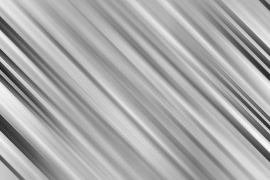 Çarpıcı bir monokromatik soyut görüntü çeşitli gri tonlarda keskin, paralel çapraz çizgiler oluşturarak yapılandırılmış hareket ve görsel doku hissi yaratır..