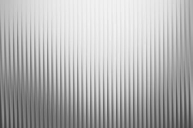 A simple and elegant gray background featuring vertical lines, perfect for adding a touch of modern sophistication to any design project. Ideal for presentations and more.