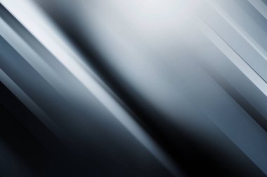 Gümüş ve gri tonlarda köşegen çizgileri olan parlak ve soyut bir arkaplan, çeşitli yaratıcı projeler için modern ve minimalist bir tasarım yaratıyor..