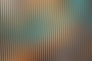 Dikey çizgiler ve bulanık kahverengi, yeşil ve mavi bir gradyan içeren büyüleyici soyut bir arka plan, çeşitli tasarım ihtiyaçları için mükemmel, yumuşak, rüya gibi bir etki yaratır..