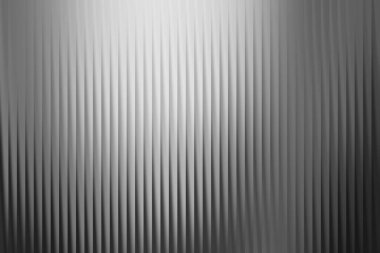Dikey çizgileri olan bu gri tonlu gradyan, herhangi bir tasarım projesine derinlik ve zarafet eklemek için mükemmel, sofistike ve modern bir doku sağlar..