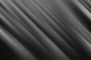 Herhangi bir tasarım projesine modern zarafet katmak için ideal, köşegen ışık ve gölge çizgileri içeren sofistike siyah ve gümüş soyut bir zemin.