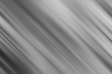 Bu çağdaş resim, çeşitli uygulamalar için parlak ve çok yönlü bir zemin sağlayan gri ve gümüş tonlarında köşegen çizgileri olan şık ve soyut bir tasarımı sergiler..