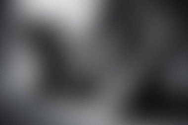 Gri ve siyah tonlarında bir ışık ve gölge oyunu sergiliyor. Modern, atmosferik bir his için..