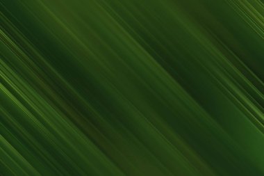 Koyu yeşil köşegen çizgileri içeren soyut bir arkaplan. İnce bir dokusu var. Hareket ve derinlik hissi veriyor. Dijital sanat ve tasarım projeleri için ideal.