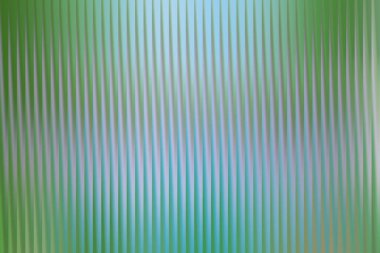 Dikey tırtıklı dokuya sahip soyut bir görsel kompozisyon. Renkler yeşilden maviye karışıyor, yumuşak, bulanık ve ruhani bir etki yaratıyor..