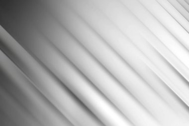 Gri tonlarda keskin, paralel köşegenler içeren dinamik soyut bir arkaplan hız ve sofistike ve modern tasarım hissi uyandırıyor..