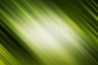 Yeşil ve sarı ışığın çapraz çizgilerini içeren soyut arkaplan yumuşak odak efektiyle hareket ve enerji hissi yaratıyor..