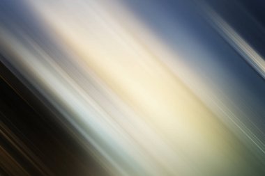 Çapraz ışık ve renk çizgileriyle soyut arkaplan, koyu mavi ve siyahtan parlak sarı ve beyaza geçiş, hafif bir hareket bulanıklığı etkisi ile.