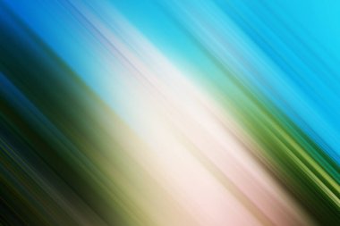 Mavi ve yeşil tonlarda köşegen ışığın yer aldığı soyut bir kompozisyon, parlak beyaz merkezli, hareket bulanıklığı ile hız ve enerji iletir..