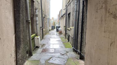 Street view in Peebles, Scottish Borders. Beautiful old village town in the Borders area of Scotland. Historic buildings and architecture.  clipart