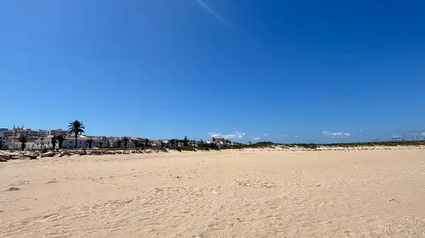 Meia Praia Beach at Lagos, Portugal. Sandy wide open ocean view on a sunny day. Beach vibes
