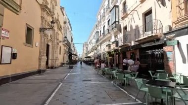 Old town centre in southern Spain showing Andalusian architecture, plazas, narrow streets, white buildings, classic facades and urban character in El Puerto de Santa Maria