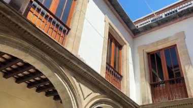 Old town centre in southern Spain showing Andalusian architecture, plazas, narrow streets, white buildings, classic facades and urban character in El Puerto de Santa Maria