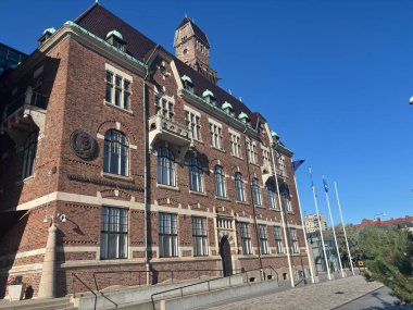 Architectural landmarks of Landskrona Sweden such as 16th-century Citadel fortress 18th-century Sofia Albertina Church and red-brick town hall amid central streets and harbor views.