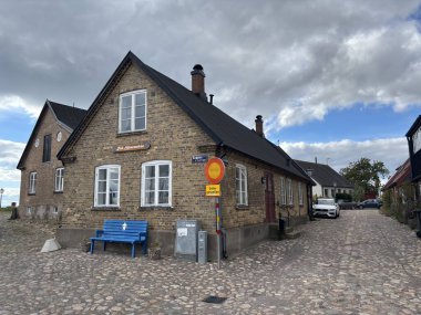 Scenic Raa Sweden locality featuring historic 19th-century fishing port marina pebbled shoreline dunes and traditional wooden architecture near Helsingborg. R