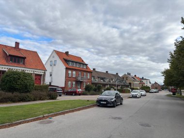 Scenic Raa Sweden locality featuring historic 19th-century fishing port marina pebbled shoreline dunes and traditional wooden architecture near Helsingborg. R