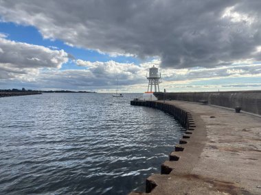 Scenic Raa Sweden locality featuring historic 19th-century fishing port marina pebbled shoreline dunes and traditional wooden architecture near Helsingborg. R