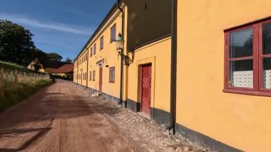 Exterior of Landskrona Citadel built 1549-1559 by Danish King Christian III in Sweden showing intact fortifications square core round towers wide moats and historical ramparts in urban coastal setting.