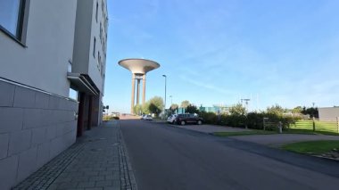 Views of Landskrona Sweden city centre with park amid pedestrian streets and plaza areas.