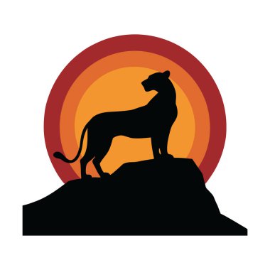 Dişi aslan Rocky Outcrop 'un üzerinde duruyor.