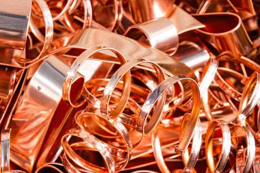 close up of copper wire scrap or waste. copper products batched together. industrial production, mining, casting aluminium, iron, copper, rolling products, scrap recycling, copper bar, tube, metal, recycled copper. clipart