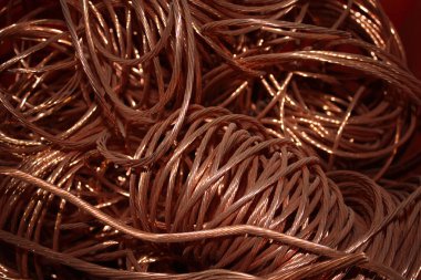 close up of copper wire scrap or waste. copper products batched together. industrial production, mining, casting aluminium, iron, copper, rolling products, scrap recycling, copper bar, tube, metal, recycled copper. clipart