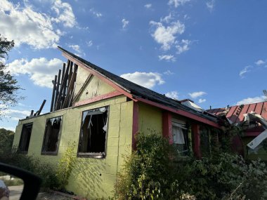 Clarksville, TN, USA - October 3, 2024: Significant tornado damage to a building that has not been repaired 10 months later clipart