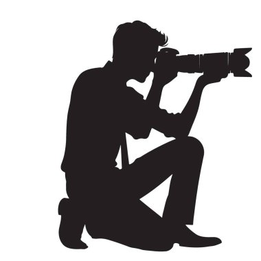 Fotoğrafçı, diz çökmüş duruş siluetinin resimlerini çekiyor