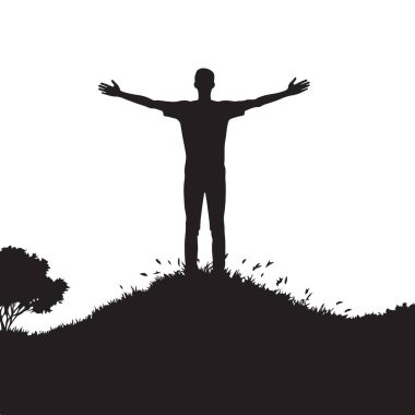 Hilltop 'ta duran ve doğanın tadını çıkaran adamın silueti.