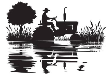 Çiftçi kırsal alanda traktör silueti sürüyor.