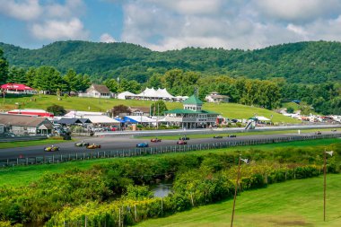 Lime Rock Park is a road racing venue in Lakeville, Connecticut.  It is a natural terrain 1.5 mile cirduit. clipart