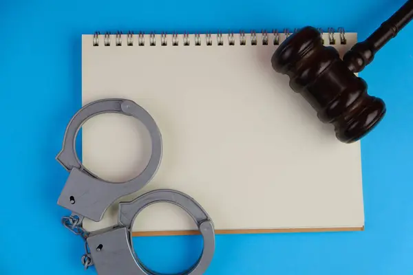 Legal, criminal or law theme with text space . law and order concept with the court hammer on the table. Flatlay