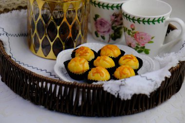 Popular cookies in Malaysia during celebration of Eid Mubarak (Hari Raya) on white isolated background. pineapple tart, chocolate chips, jam cookies, layer cake legit clipart