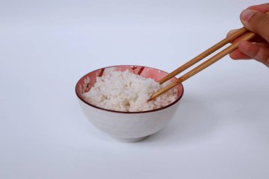 Çubuk ve kase pilav.