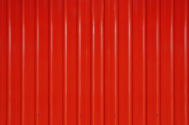 Kırmızı metal arka plan. Parlak kırmızı çatı veya kırmızı metal kaplama..