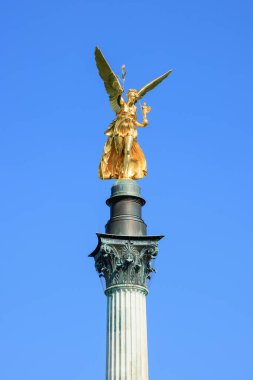Nike Victory Goddess Sculpture as Peace Monument with Peace Angel - also Friedensengel - is landmark, monument and sightseeing spot of the Maximiliansanlagen in Munich - Bavaria, Germany, Europe