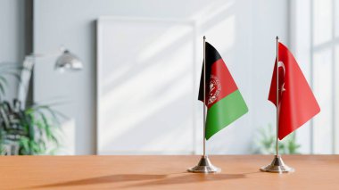 FLAGS OF AFGHANISTAN AND TURKEY ON TABLE clipart