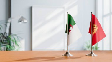 FLAGS OF ALGERIA AND KYRGYZSTAN ON TABLE clipart